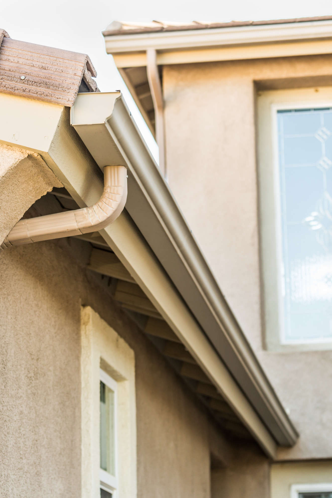 House With New Seamless Aluminum Rain Gutters.